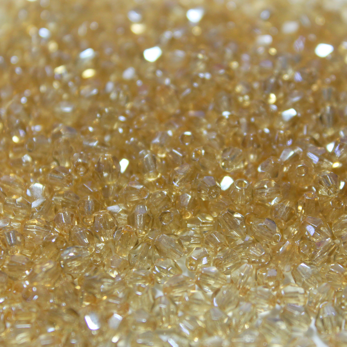 4mm Transparent Champagne Glass Bicone - 4B04-A