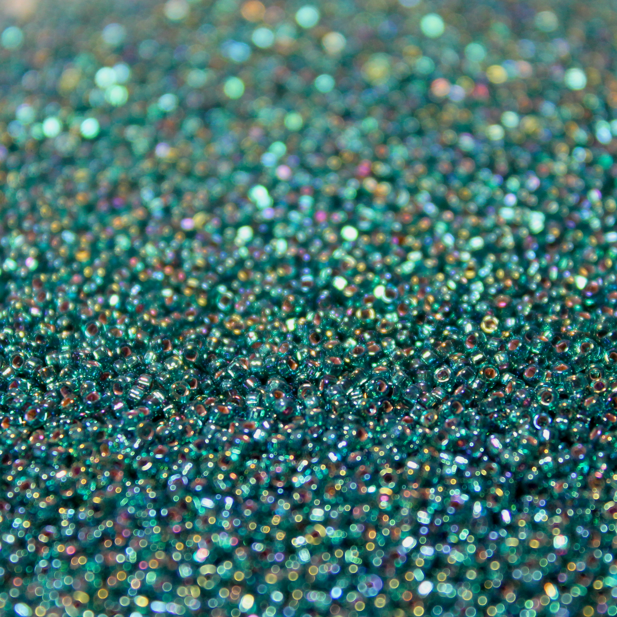 Transparent Teal Silver Lined AB ~ 15/0 JSB 643