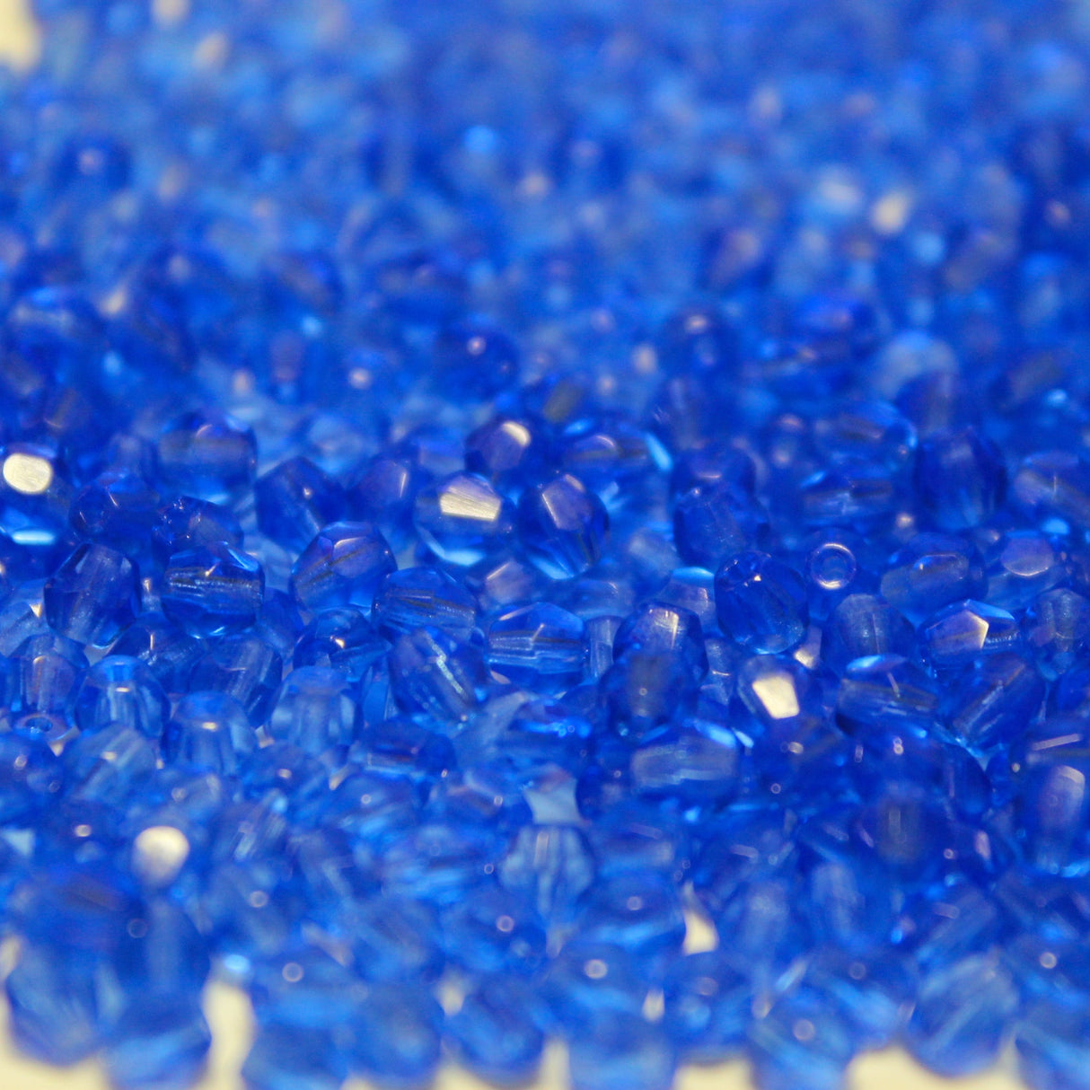 4mm Transparent Sapphire Blue Czech Glass Bicone - 4B23-A