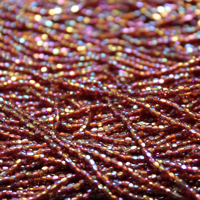 12/0 Tri-Cut Transparent Ruby Iris - 12T30