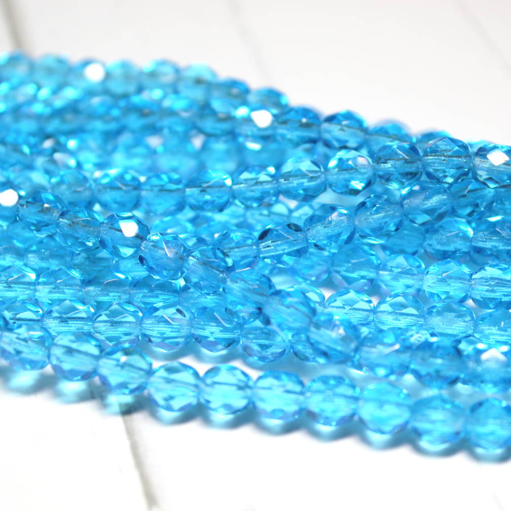 6mm Czech Fire Polished Round Transparent Aqua - F653