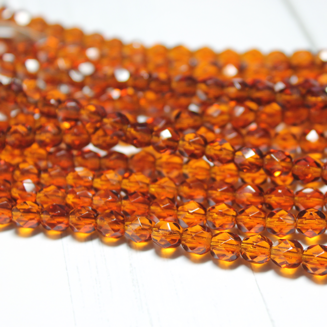 6mm Czech Fire Polished Round Transparent Dark Smoked Topaz - F659