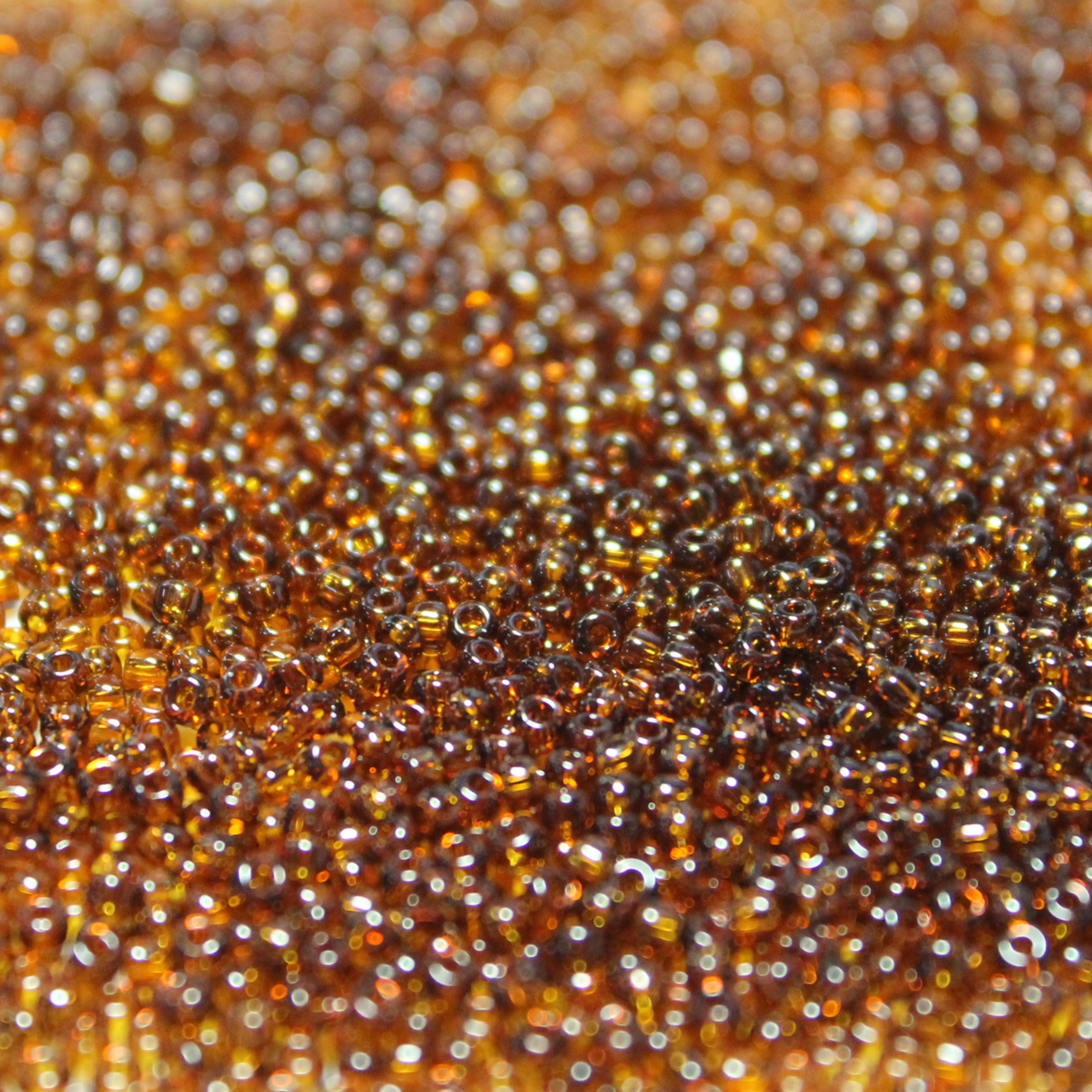 Transparent Dark Topaz ~ 15/0 JSB 134