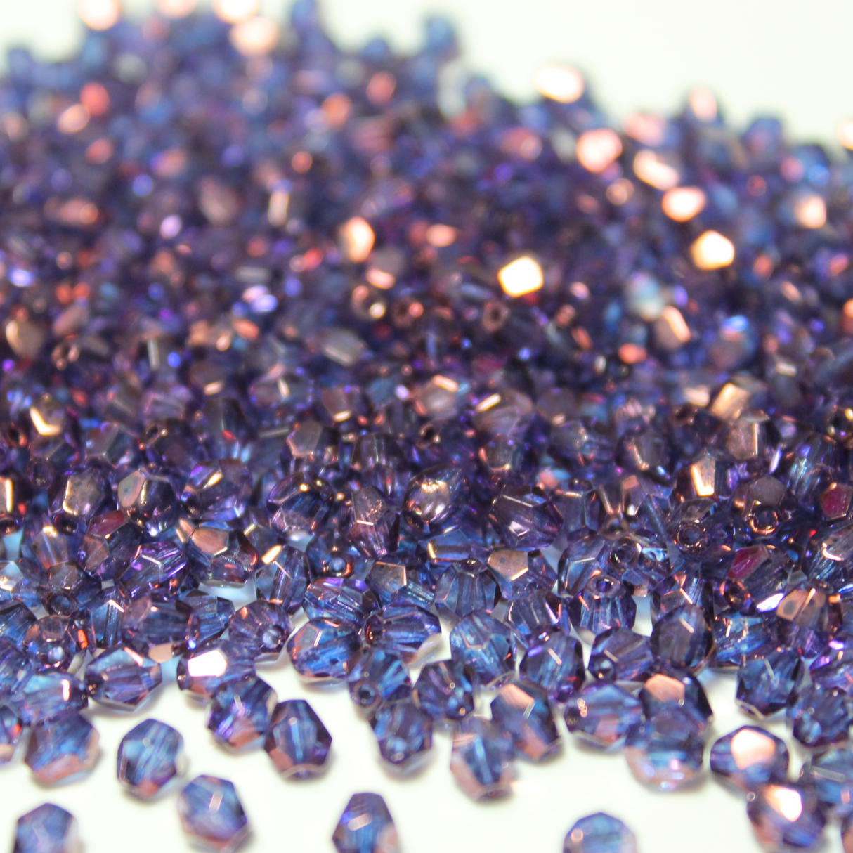 4mm Lumi Amethyst Glass Bicone - 4B22-A