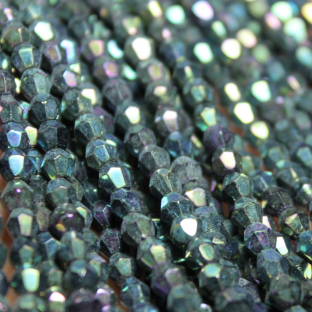 4mm Czech Metallic Green Iris Glass Bicone - 4B26-A