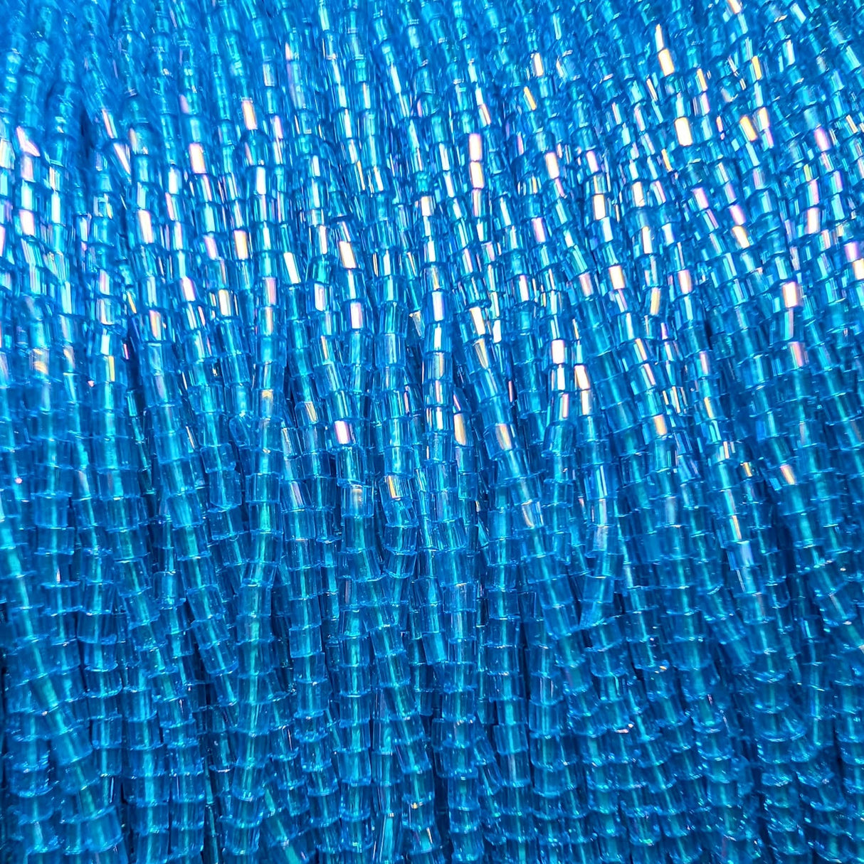 11/0 Czech 2 Cut Transparent Dark Aqua Iris - 112C-25