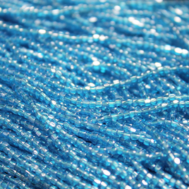 ***CLOSEOUT *** 9/0 Tri-Cut Transparent Dark Aqua Luster - 9T116