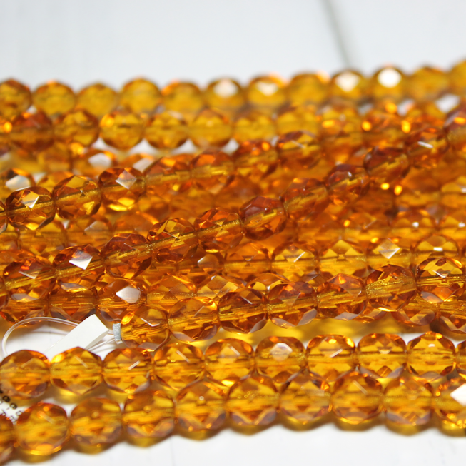 6mm Czech Fire Polished Round Transparent Dark Amber - F663